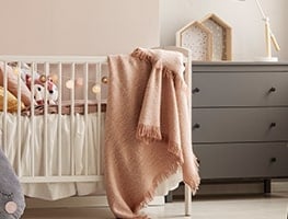 Baby cot in a nursery