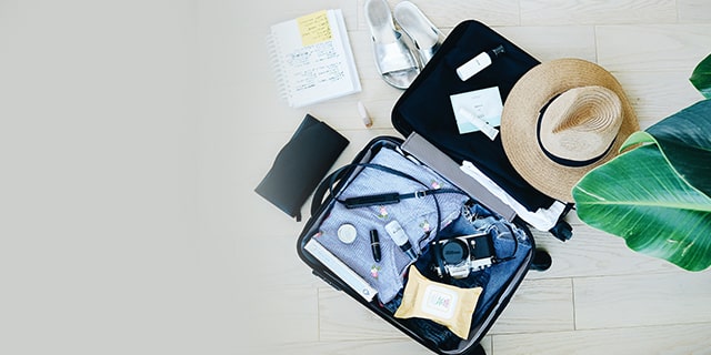 Travel items in a suitcase